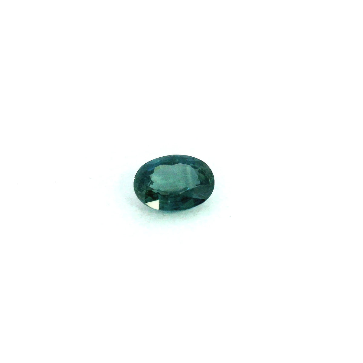 0.61ct Oval Natural Sapphire (Colour Green, Clarity Moderately Included, Cut Faceted)