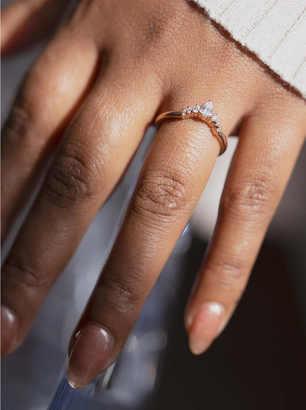 The Chevron Pear and Round Accented Ring